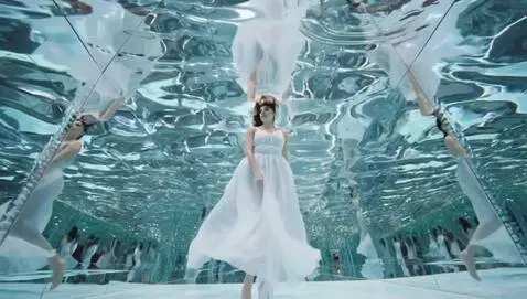A Supermodel floating in a Paradoxical Mirror Re